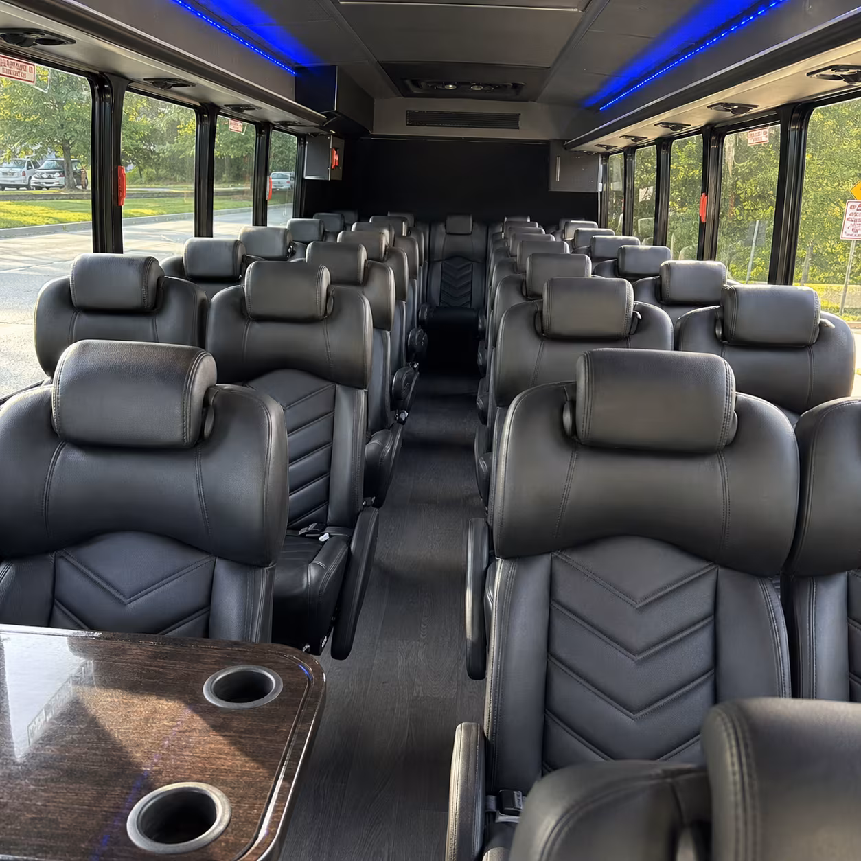 Rent a Bus to Acrisure Bounce House